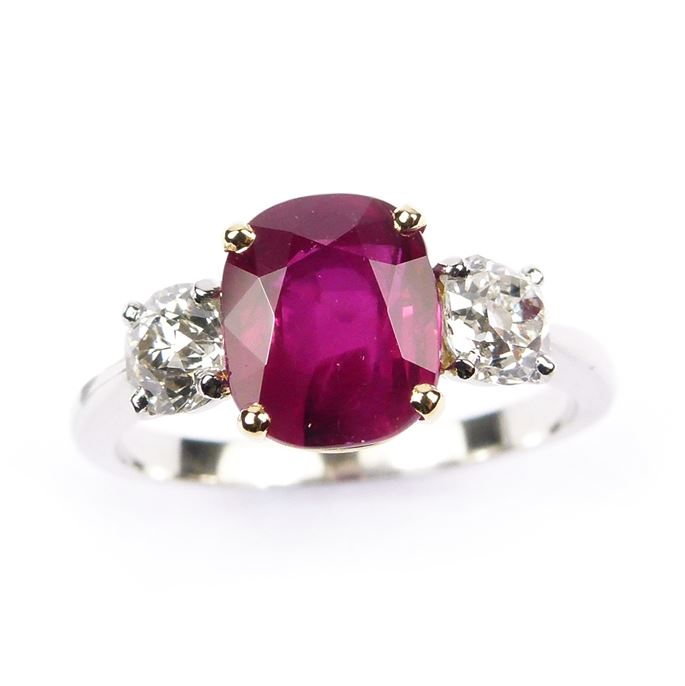 Ruby and diamond three stone ring, claw set with a cushion cut 2.52ct Burma ruby, | MasterArt